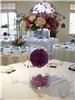 Enchanted Florist, Pasadena — Wedding centerpeice using orb suspended in cylinder.