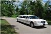 Executive Limousines of Destin, Destin — The Executive Coach Builder's Limousine will accomodate 10 individuals. The luxurious limousine features fiber optic lighting, a full bar, mirrored ceiling, DVD/VCR and leather seating.