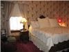 Entire Facility, Three Roses Bed and Breakfast, Pontiac — The Garden Room has a king size bed for overnight guests.