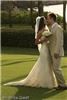 Rhonda Giedt Photography - San Jose, San Jose — Bride and Groom kiss in rain in Maui at destination wedding in Hawaii.