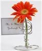 The Funky Shack Art Studio, Atlanta — This is just one of many items that I design and create. This is a mini bud vase card holder that serves as a place card holder, table number holder, or wedding favor. It is made with shiney silver wire twisted around a mini glass bud vase perfectly to hold a card.
