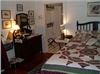 Victorian Lace Bed and Breakfast, Victorian Lace Bed and Breakfast, Marion — The Summer Kitchen or Cottage has quaintly been taken back to the charm of yesteryears. It has the wainscoting walls and ceiling from days gone by, yet is as modern as a private whirlpool for two, central heating and air conditioning and cable television. There is a private entrance for this secluded cottage away from it all. The Summer Kitchen or Cottage was originally where the lady of the house would do her cooking and canning in the summer time to keep the heat out of the house. This quaint cottage is furnished in antique kitchen theme.