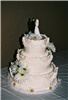 The Cake Goddess, Portland — Simple, piped decoration in butter cream.  All butter cream from The Cake Goddess is made only with butter, never shortening or margarine. Flowers placed according to client request. Flowers in silk according to client request.