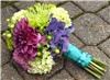 Snapdragon Studio, Vancouver — This bright & bold bridesmaid's bouquet features hydrangeas in several colors, purple dahlias, green spider mums, green hypericum berries, and green button pom flowers.