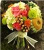 Snapdragon Studio, Vancouver — This fun & funky bride's bouquet features petaled sunflowers, corkscomb, hydrangea, button poms, hypericum berries, and roses.