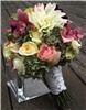Snapdragon Studio, Vancouver — Romantic bride's bouquet featuring dahlias, hydrangea, roses, orchids, and pods.