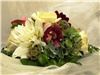 Snapdragon Studio, Vancouver — Wedding cake flowers, featuring dahlia, hydrangea, orchids, and calla lillies.