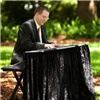 Eric Redmond, Pianist/Vocalist, Gainesville — Digital piano at outdoor event with drape