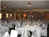 Ward Plaza Restaurant, Pub & Ballroom, Aberdeen — This photo shows the mezzanine section of the Ward Plaza Crystal Ballroom fully set and decorated for a wedding. Photo shown includes optional features including decorator provided centerpieces and chair covers.
