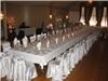 Ward Plaza Restaurant, Pub & Ballroom, Aberdeen — This photo shows the Ward Plaza Crystal Ballroom dance floor set with a unique configuration. The table is considered a large family style set-up with seating for 32 people which was used in lieu of a head table for this specific event.