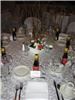 Ward Plaza Restaurant, Pub & Ballroom, Aberdeen — This photo shows a traditional wedding or anniversary table layout/place setting including several optional decorator provided items including table linen overlay and chair covers.