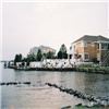 The Sunset House, Resort Pointe, Fenwick Island — View of the back yard with a wedding ceremony arrangement.