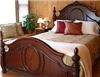 The Brewster Inn, Dexter — The Honeymoon Suite  -  A splendid, rustic yet elegant, three room suite! Perfect for a romantic honeymoon, anniversary, bride's retreat or other special getaway. 

The spacious main room has an elegant queen size bed and a large sitting area with sofa and cozy gas log fireplace. Enjoy the warm ambience of natural wood paneling. A large book case (filled with books) adorns an entire wall while a nostalgic cheval mirror stands in the corner.

Curl up in front of the fireplace for a romantic evening, or watch a movie on the adjacent television. A small sitting room (not shown) with double futon offers extra space for additional guests. The private bath has a shower stall plus whirlpool tub for