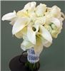 Sparks Florist, Sparks — Our elegant monochromatic Venice bouquet features premium white Eufloria roses and white mini-callas featuring subtle hints of yellow and green tones for the perfectly soft and pure design. Exceptional!
