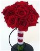Sparks Florist, Sparks — Our Red Romance bouquet features an absolutely beautiful cluster of all red premium Eufloria roses in a simple hand-tied bouquet with matching stem wrap in red sheer ribbon with faux pearl bead banding. Terrific!