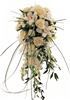 Sparks Florist, Sparks — This cascade is a lovely monochromatic version of our "Ever After" bouquet for the all white wedding and features white cymbidium blossoms, white dendrobium sprays, white roses, and white freesia accented with Italian ruscus, bear grass, ming and leatherleaf ferns. Beautiful!