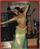 Kamilah Belly Dancer, Dallas — Kamilah, originally from Brazil, began to dance at age six, where she mastered the arts of Jazz and Modern Ballet. 
She took her first Belly Dance class, and it was love at first shimmy. 
She performs incorporating the use of sword, cane and veil.
She likes to incorporate some Latin influenced hip movements, which also makes her shimmies one of a kind. She has also cultivated her performance skills through extensive experience entertaining in restaurants, nightclubs, and a multitude of public and private events.
Classy, Charismatic, Energetic and full of personality are a few of the words people use to describe Kamilah on stage . She brings the fire and passion of her Brazilian background and fuses with Middle Eastern dance on her performances.
She is a exclusive house dancer at Al- Amir Dallas and Al- Amir Addison.