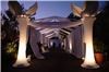 Best Of The Best Event Productions, Fountain Valley — The entry way for our great 50th private birthday party at Shady Canyon.  This set the beautiful tone for the rest of the decor as the attendees were drawn in by the flowing fabric tunnel, capped off by the lit palm trees at the entrance.