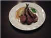 John's Angels Catering LLC, Whitefish — Rack of lamb marinated in garden mint oil and slow grilled with applewood over truffle mashed potatoes and summer squash with carrot slivers.