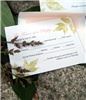 hullabaloo studios, Lisbon — This eco-friendly design uses recycled paper. Scanned leaf pattern adorns all of the coordinating accessories including wedding invitation, wedding programs and thank you notes.©hullabaloo studios