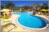 Mike Ditka Resorts Runaway Beach Club, Kissimmee — The Key West themed pool is more flamboyant and colorful with wild reds and engaging blues. This pool combines zero depth entry safety with water features to create a pool experience unlike any other in Orlando.