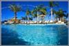 Mike Ditka Resorts Runaway Beach Club, Kissimmee — Two Florida themed pools present the perfect compliment to your comfort and relaxation. The South Beach themed pool is an adult oriented pool with a connecting sundeck to enjoy the Florida sun.