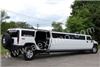 AEX Limo, Chicago — This Hummer Limo is One of a Kind Custom built Limousine has Granite Floor, Multiple Mini Bars with Crystal Glassware, 32 inch Flat screen Plasma TV, 2 Additional flat screen TV's, 3000 Watt Booming sound system with subs, DVD with surround sound, CD, Mirror Ceiling with color changing fibre optics, disco lighting, color changing neon, strobes, 2 tone leather seating, Under the Limo color changing Neon, Exterior strobes, Custom Wheels, and MUCH MUCH MORE.