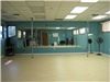 Fitness Dance Studio, Orlando — 950 sq ft of open floor space with wood floors and mirrors. We have fold up tables and chairs. Restroom on property as well.