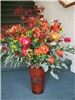 Enchanted Florist - Everett, Everett — Fall colors burst to life in a bouquet designed for an Ocotober wedding.
