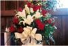 Enchanted Florist - Everett, Everett — Cream satin ribbons tie this bouquet together and add a touch of elegance.  Countryside Gardens in Arlington has a lovely chapel on the top floor of a vintage barn.  Beautiful and rustic all at the same time.