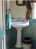 Pump House B&B - Williamsport, Williamsport — Your cozy powder room contains a shower, bowl of toiletries, iron, ironing board and hairdryer.
