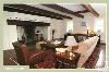 Great Room, Inn At Glencairn, Princeton — Great Room with a twelve foot wide original cooking fireplace, and is decorated with fine antiques throughout, a revolving art collection, and oriental carpets over random width pine floors.