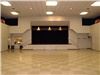 Holly Auditorium, Holly Community Center, Union City — A view of the stage and banquet floor.  The full kitchen is visible to the left of the stage.