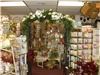 Impressions Everlasting, Hays — This black arch and the florals adorning it are samples of our rentals.  You see the store is full, floor to ceiling, of all kinds of gifts.  Many are customizable and we are happy to fill special orders!