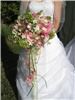 Flowers Forever Design, Englewood — Hand-tied garden mix with cascading flowers.