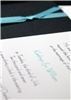 k notes, LLC creative stationery & photography, Cincinnati — Ribbon tied around a rich, textured black card stock finishes this wedding invitation to match the bridesmaids' dresses.