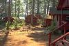 Entire Facility, Kingsley Pines, Raymond — Private cabins are located along the lake or nestled among our great pines. Most or our cabins have their own private bathrooms. Cabins without bathrooms share modern bathhouses. All cabins have electricity.