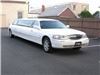K and G Limousine Services Inc, New Hyde Park — 10 Guest Lincoln Town Car Limo (White)  
Our Stretch (6-10 pax) and Super-Stretch (14 pax) Lincoln Town Car Limousines can accomodate 2-14 people comfortably. All come fully equipped with Color TVs, VCRs, AM/FM CD Stereo, Fiber Optic Lighting, Star-Gazer Mirrored Ceilings, Privacy Divider, and Ice Chests.