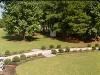 B&B Country Garden Inn, Apex — Stroll along this long walkway to the lowerdeck overlooking the pond!