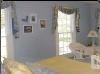 B&B Country Garden Inn, B&B Country Garden Inn, Apex — Done in blues & yellows, this crisp bright room gives tribute to Bud's mother, Virginia McKinney. Ms. McKinney's love of the Texas Bluebonnets makes this cheery room special. A king-size bed, photos of the past, view of our white swans & bluebonnets makes this a room to remember!