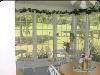 Sunroom, B&B Country Garden Inn, Apex — Enjoy your breakfast in the sunroom while overlooking the grounds of the inn. The sunroom makes a great place to hold company events, bridal showers & more!