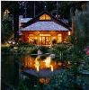 Nestldown, Los Gatos — Tucked in the surrounding gardens, The Barn is a 3200 square foot structure. Perfect for small meeting from 5 - 60 guests. Elegant enough for a special gathering of up to 180 guests.  Just to the side of the structure is a huge lawn area providing dining space (shaded by tall Redwoods) and plenty of space for outdoor teambuilding activies.