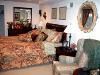 Entire Facility, Lion's Head Guest House, Jamul — Private french door entrance and elegant styling set this wonderful suite apart from your typical accomodations. This room has a private bathroom and walk in closet. This room along with the Jade room are the two rooms without Jaccuzzi tubs. The room is slightly smaller (cozier) than the Athens, Parisian, and Amethyst. It is an excellent value and those wanting to get away on a budget may find either the Amber Room or Jade Room just what they are looking for.