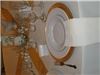 EMS Party Rentals LLC, Bastrop — We now have gold chargers!  Beautiful!  Sample Set up for a consultation with a bride for a September 2010 wedding with full service set-up.  Beautiful... Ivory linens, white plates, white wood chairs.