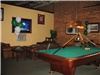 Gamecock Alley, Jillian's Eat Drink & Play, Columbia — Gamecock Alley is a relaxed semi-private space that offers 2 Brunswick billiards tables, 1 ping pong table and i shuffleboard table to play on. Hang out and watch the game on a 65 inch TV on the leather sofas or on one of the 3 other 42 inch TV's. Perfect for a birthday party, after work social, drop in event or holiday party. Ask abbout adding the Wii. 
$80 per hour and includes unlimited play on all 4 table.