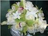 Always Beautiful Designs by Stella, Berlin — Beautiful mix of gardinias,roses,stephondis and green cymbinium orchids in hand tied bridal bouquet.