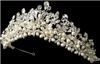 Fairytale Bridal Tiara, Miami — Classic and dazzling, this tiara features creamy freshwater pearls, rhinestones, and silver vine details.