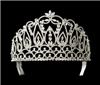 Fairytale Bridal Tiara, Miami — This grand tiara is an elegant pattern of silver plated swirls covered in rhinestones. It is lined with square shaped rhinestones to form the base of the piece. The elegant style makes this piece great for pageant contestant.