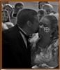 Buzby Video Productions, Spartanburg — The father kisses his daughter as he give her away to her childhood sweetheart.