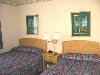 Shephard's Beach Resort, Clearwater Beach — Our most popular rooms are located adjacent to the pool and are just steps away from the beach! Arranged in a "U" shape on two levels, the suites consist of two separate rooms that make up the bedroom and living areas (each with a TV), kitchens complete with cook top, microwave and large refrigerator, sleeper sofa, all the amenities from home and a spacious deck area overlooking the pool.
